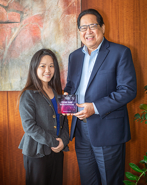 Vivian La and Craig Lock with the award