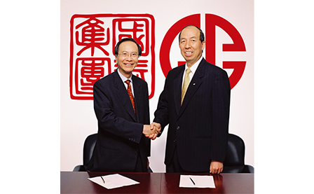 Dunson K. Cheng, Chairman of the Board, President, and Chief Executive Officer, Cathay Bancorp, and Peter Wu, Chairman, President and CEO of General Bank and GBC Bancorp, at the time of the merger, shook hands. 