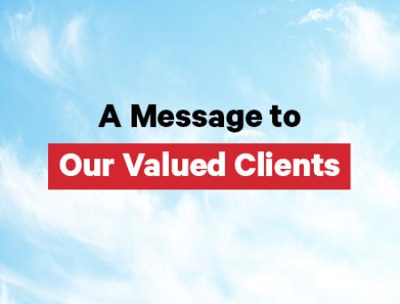 The image of a blue sky and clouds with the Cathay Bank logo on the corner and text which reads a message to our valued clients.