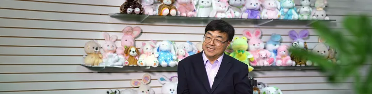 Megatoys CEO Charlie Woo accepting an interview in his office. 