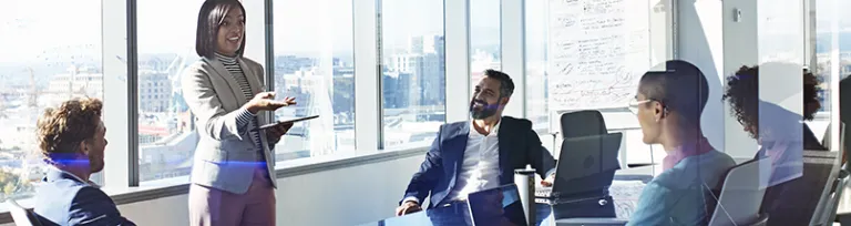 Young entrepreneur presenting project in exclusive boardroom