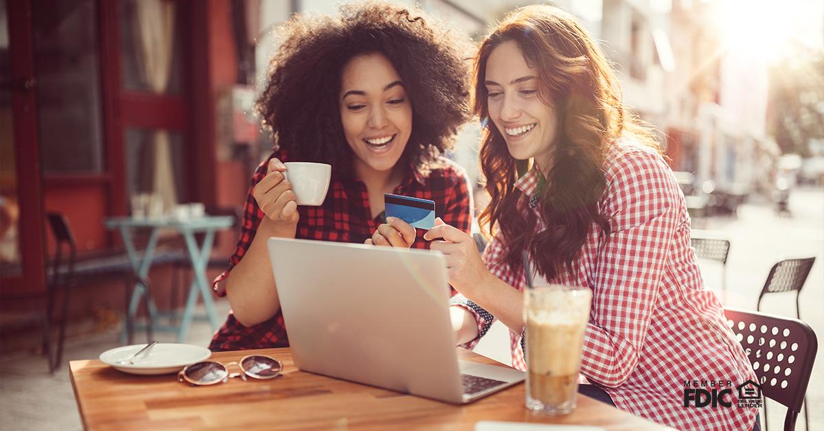 Girls drinking coffee and shopping online.