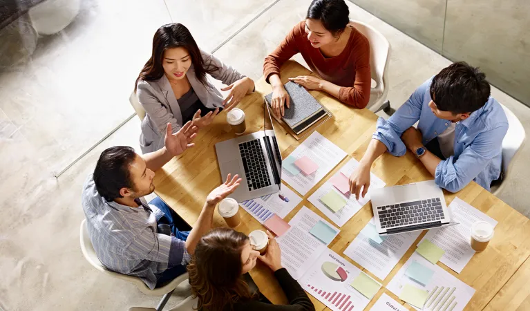 Multiethnic business team meeting in office.